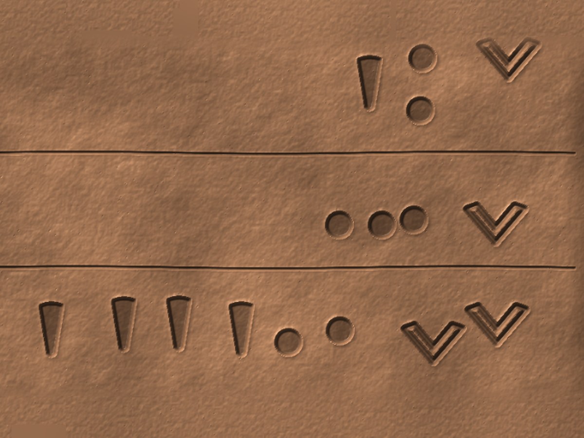 Proto-Elamite numerals pressed into a clay tablet