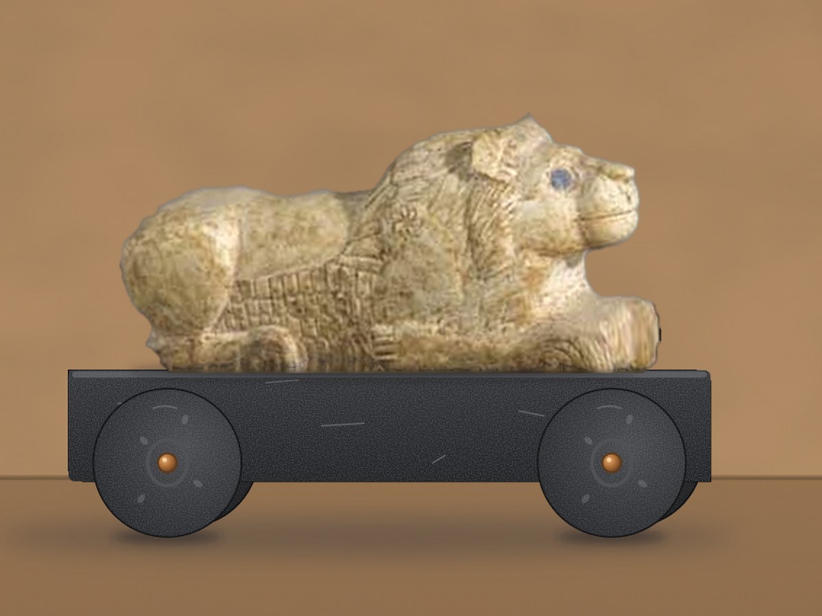 Elamite children’s toy: a stone lion on a wheeled cart, from Susa